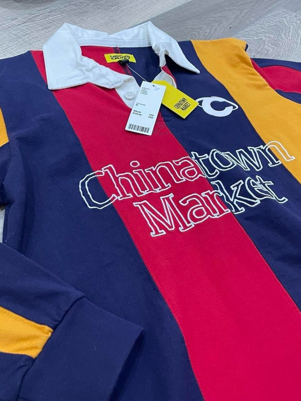Urban Outfitters Chinatown Market Navy Red Gold Rugby Polo